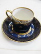 coppia di tazzine da caffe in blu e oro